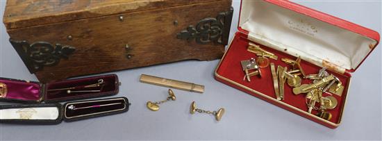 A pair of early 20th century 9ct gold cufflinks, three stick pins, a Vickery pencil and other assorted cufflinks.